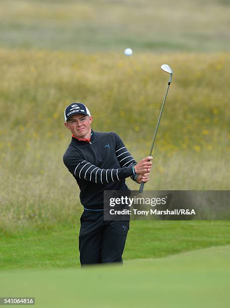 Scott Gregory of Corhampton chips on to the 10th green during The Amateur Championship 2016 - Day Six at Royal Porthcawl Golf Club on June 18, 2016...