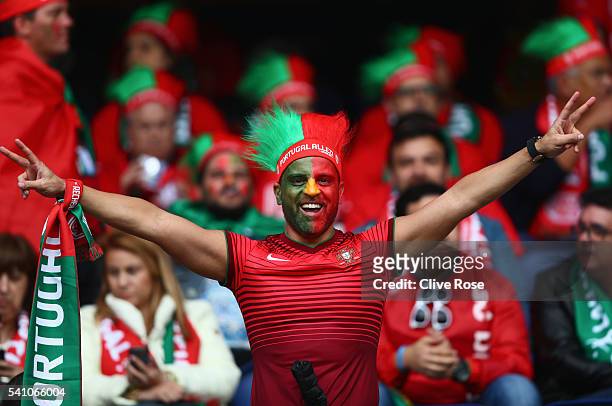 Portugal fan enjoys the atmosphere prior to the UEFA EURO 2016 Group F match between Portugal and Austria at Parc des Princes on June 18, 2016 in...