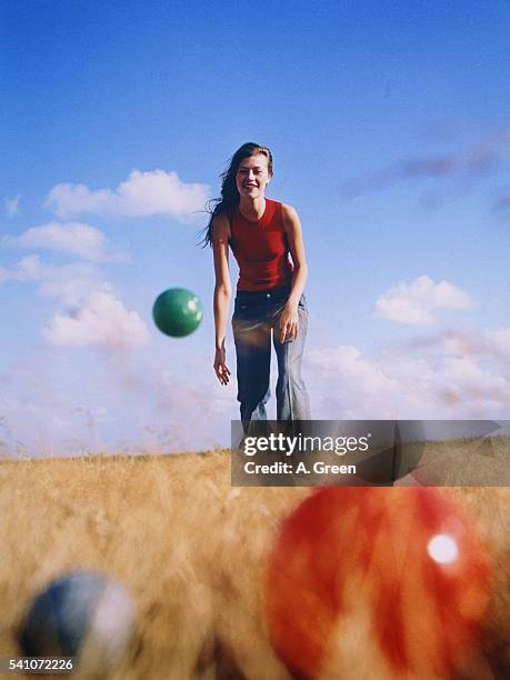 woman playing boccia on a field - petanque stock pictures, royalty-free photos & images