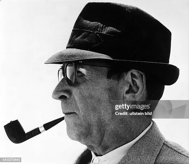 Simenon, Georges *13.02..1989+Schriftsteller, Belgien- Portrait im Profil mit Hut und Pfeife- 1968