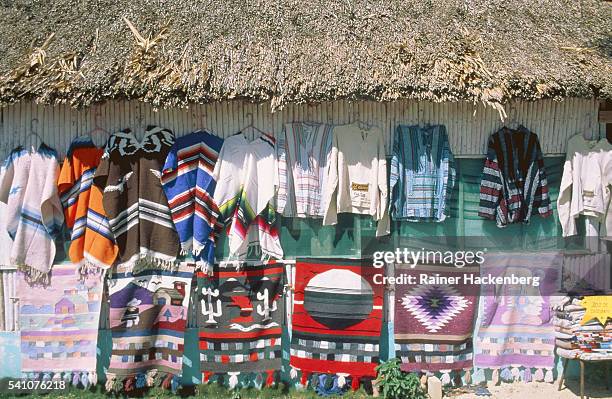 shop with typical crafts in mexico - draped blanket stock pictures, royalty-free photos & images