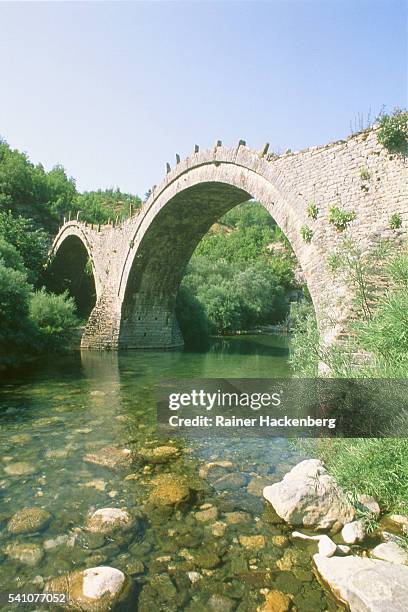 old stone bridge near kipi in epirus (greece) - kipi stock pictures, royalty-free photos & images