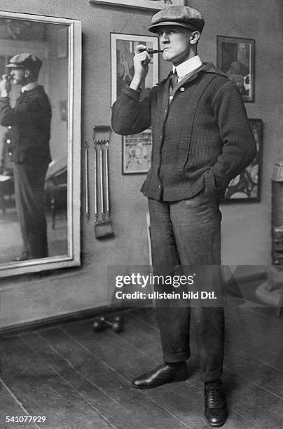 NAmerican painter. Grosz in his studio in Berlin, Germany, 1921.