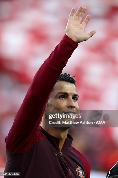 Cristiano Ronaldo of Portugal waves to his son prior to the UEFA EURO 2016 Group F match between Portugal and Austria at Parc des Princes on June 18,...