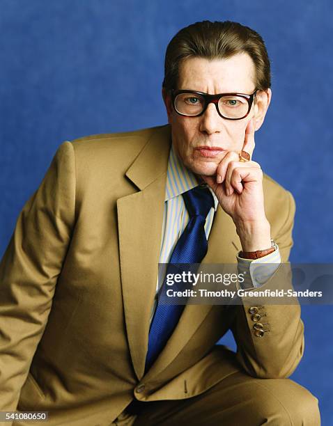 Fashion designer Yves Saint Laurent poses for a portrait in 1999 in New York City.