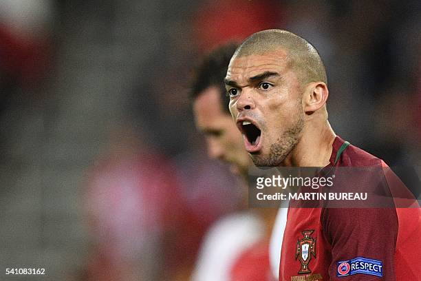 Portugal's defender Pepe shouts during the Euro 2016 group F football match between Portugal and Austria at the Parc des Princes in Paris on June 18,...