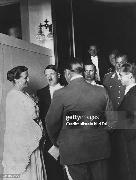Adolf Hitler*20.04.1889-+Politician, Nazi Party, GermanyA.H. Talking to Winifred Wagner in the foyer of the Bayreuth Festspielhaus during an...