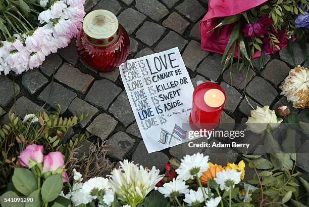 Makeshift memorial is seen during a vigil for victims of a shooting at a gay nightclub in Orlando, Florida nearly a week earlier, in front of the...