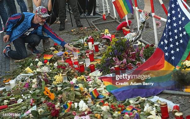 Mourner attends a vigil for victims of a shooting at a gay nightclub in Orlando, Florida nearly a week earlier, in front of the United States embassy...