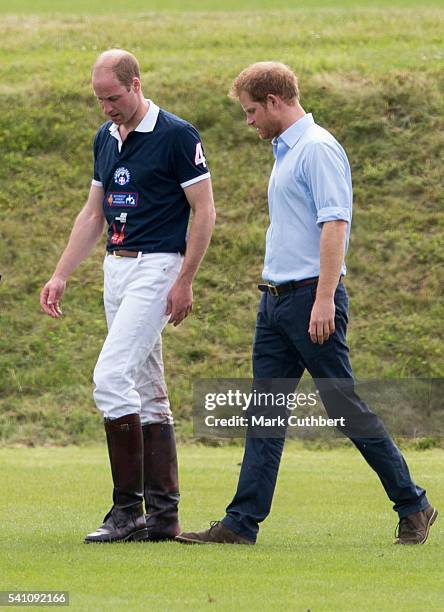 Prince William, Duke of Cambridge and Prince Harry during the Maserati Royal Charity Polo Trophy at Beaufort Polo Club on June 18, 2016 in Tetbury,...