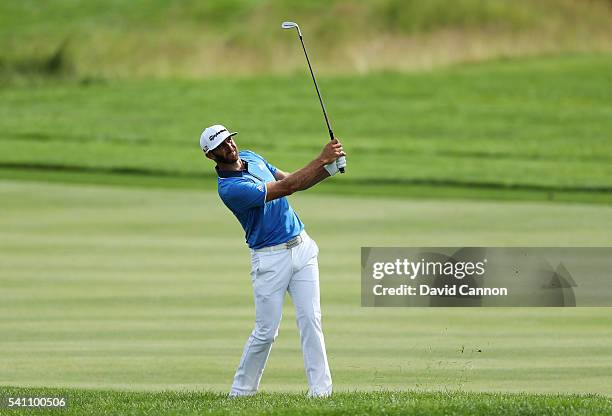 Dustin Johnson of the United States plays a shot on the third hole during the third round of the U.S. Open at Oakmont Country Club on June 18, 2016...