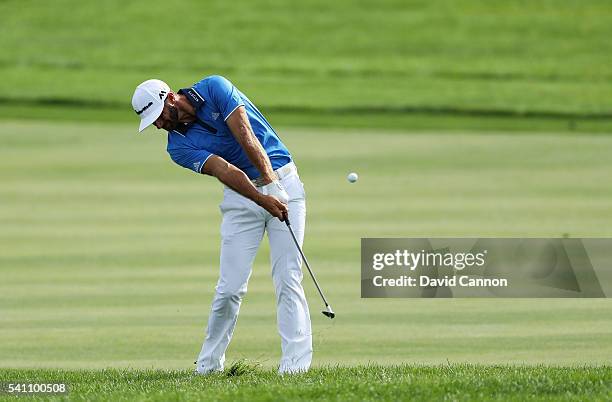 Dustin Johnson of the United States plays a shot on the third hole during the third round of the U.S. Open at Oakmont Country Club on June 18, 2016...