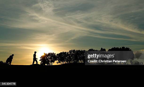 Gregory Bourdy of France walks on the 12th hole during the third round of the U.S. Open at Oakmont Country Club on June 18, 2016 in Oakmont,...