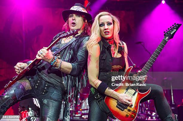 Ryan Roxie and Nita Strauss of Alice Cooper band perform at The O2 Arena on June 18, 2016 in London, E2ngland.