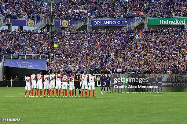 Both teams take a moment to pause in memory of the recent shooting during an MLS soccer match between the San Jose Earthquakes and the Orlando City...