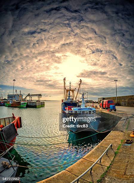 boats moored in harbour at kilmore quay in ireland - county wexford stock pictures, royalty-free photos & images