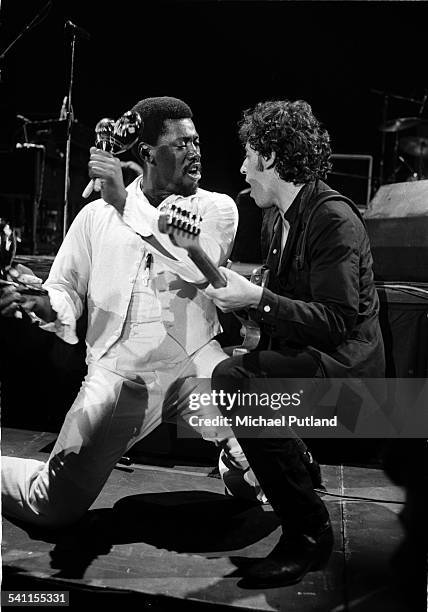 American musician Clarence Clemons and singer Bruce Springsteen on stage during their West Coast tour of the USA, 1978.