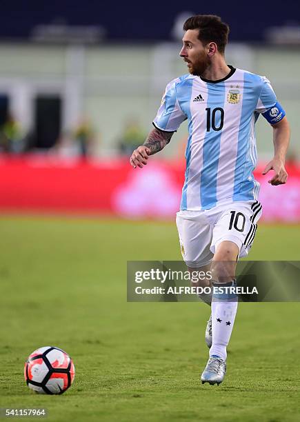 Argentina's Lionel Messi controls the ball during a Copa America Centenario quarterfinal football match against Venezuela in Foxborough,...
