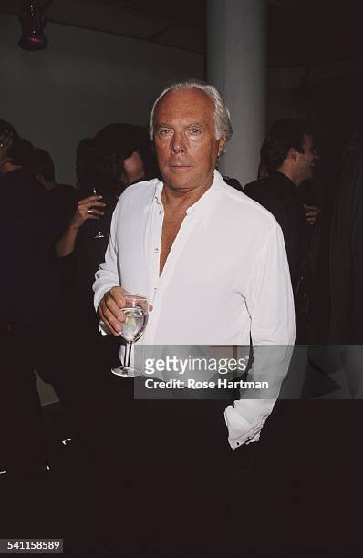 Italian fashion designer Giorgio Armani at a private party, USA, circa 1995.