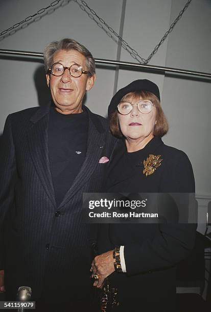 German-Australian photographer Helmut Newton and his wife, Australian actress and photographer June Newton, attending a party being held in Helmut's...