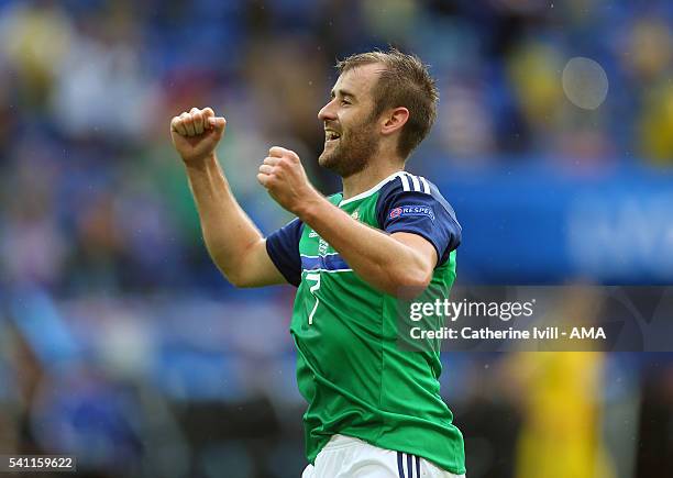 Niall McGinn of Northern Ireland celebrates during the UEFA EURO 2016 Group C match between Ukraine and Northern Ireland at Stade des Lumieres on...