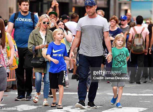 Naomi Watts, Alexander Schreiber, Liev Schreiber and Samuel Schreiber seen walking in Times Square after attending the Broadway musical Hamilton on...