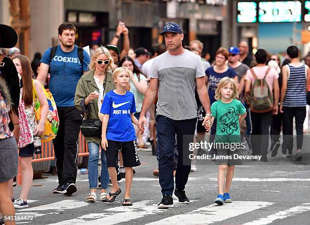 Naomi Watts, Alexander Schreiber, Liev Schreiber and Samuel Schreiber seen walking in Times Square after attending the Broadway musical Hamilton on...