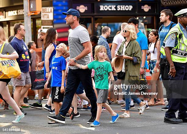 Alexander Schreiber, Liev Schreiber, Samuel Schreiber and Naomi Watts seen walking in Times Square after attending the Broadway musical Hamilton on...