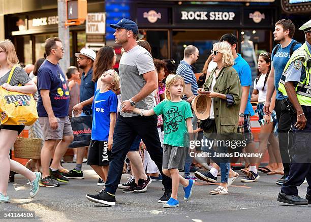 Alexander Schreiber, Liev Schreiber, Samuel Schreiber and Naomi Watts seen walking in Times Square after attending the Broadway musical Hamilton on...