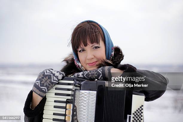 portrait of a woman with her accordion, russia - accordionist stock pictures, royalty-free photos & images