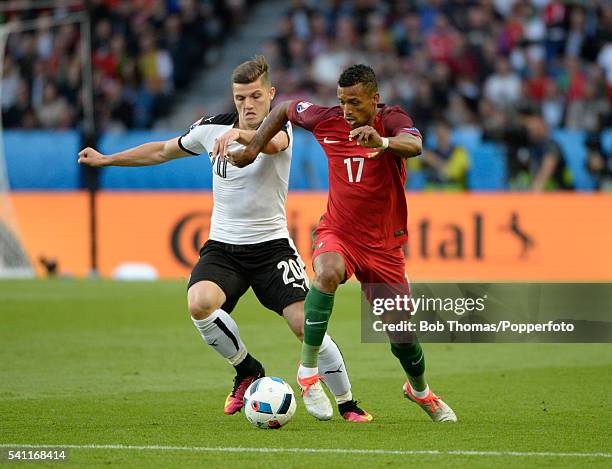 Marcel Sabitzer of Austria with Nani of Portugal during the UEFA EURO 2016 Group F match between Portugal and Austria at Parc des Princes on June 18,...