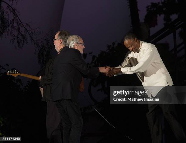 Walter Becker and Donald Fagen of Steely Dan and conductor Thomas Wilkins perform at the Hollywood Bowl Opening Night at the Hollywood Bowl on June...
