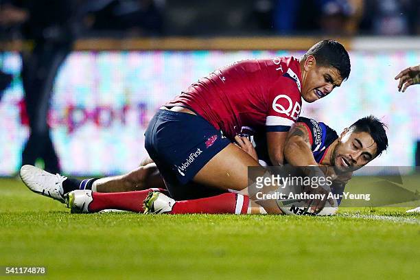 Shaun Johnson of the Warriors scores a try during the round 15 NRL match between the New Zealand Warriors and the Sydney Roosters at Mt Smart Stadium...