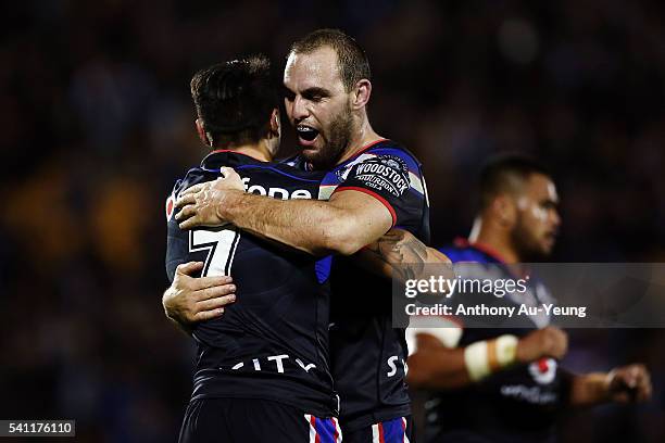 Simon Mannering and Shaun Johnson of the Warriors celebrate after winning the round 15 NRL match between the New Zealand Warriors and the Sydney...