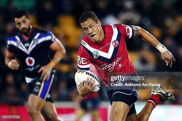 Kane Evans of the Roosters makes a break during the round 15 NRL match between the New Zealand Warriors and the Sydney Roosters at Mt Smart Stadium...