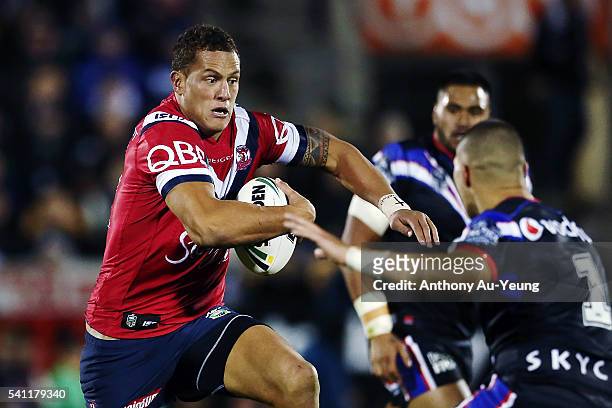 Kane Evans of the Roosters makes a run during the round 15 NRL match between the New Zealand Warriors and the Sydney Roosters at Mt Smart Stadium on...