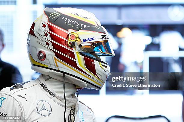 Lewis Hamilton of Great Britain and Mercedes GP in the garage during qualifying for the European Formula One Grand Prix at Baku City Circuit on June...