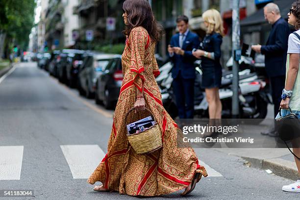 Viviana Volpicella wearing boho dress outside Dolce & Gabbana during the Milan Men's Fashion Week Spring/Summer 2017 on June 18, 2016 in Milan, Italy.