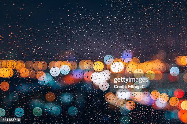 rainy night bokeh window - focus on foreground photos stock pictures, royalty-free photos & images