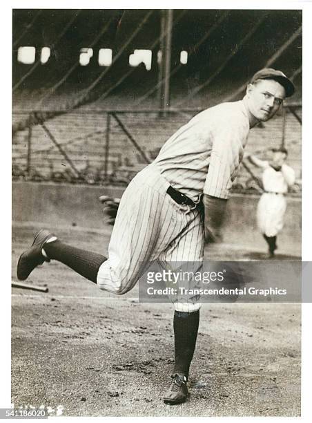 Photo of Yankees pitcher Waite Hoyt as he warms up before the start of the second World Series game at Highlander Park, New York, New York, October...