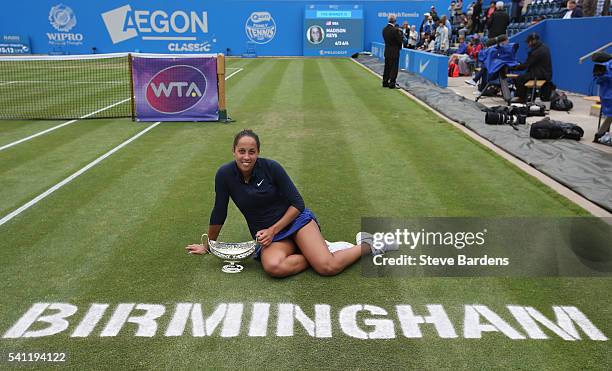 Madison Keys of United States celebrates with the Maud Watson trophy after her victory in the Women's Singles Final against Barbara Strycova of Czech...