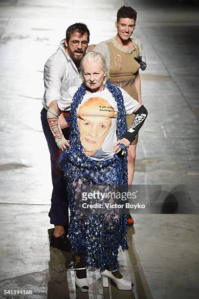 Designer Vivienne Westwood, Andreas Kronthaler and model walk the runway at the Vivienne Westwood show during Milan Men's Fashion Week Spring/Summer...