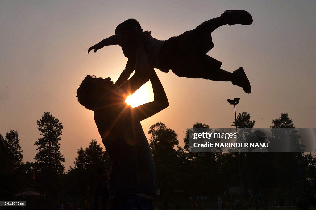 INDIA-FAMILY-FATHER