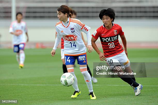 Yuria Obara of Albirex Niigata and Hana Takahashi of Urawa Reds compete for the ball during the Nadeshiko League Cup Group B match between Urawa Red...