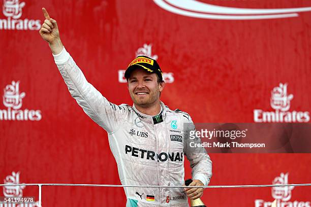 Nico Rosberg of Germany and Mercedes GP celebrates his win on the podium during the European Formula One Grand Prix at Baku City Circuit on June 19,...