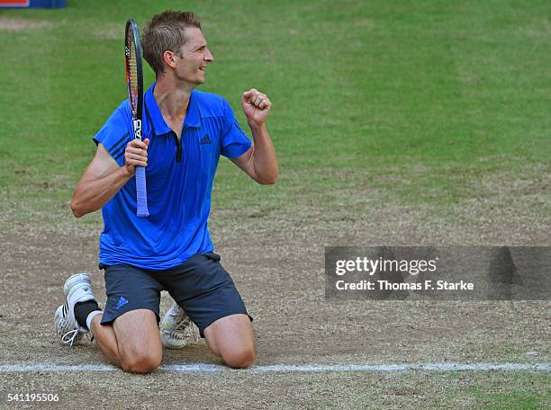 Florian Mayer of Germany celebrates after winning the final match of the Gerry Weber Open against Alexander Zverev of Germany at Gerry Weber Stadium...