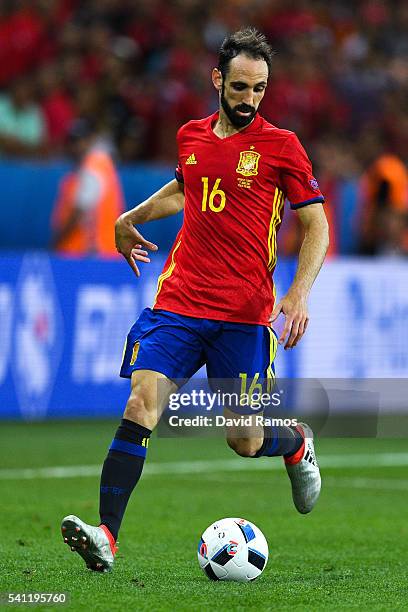 Juanfran of Spain runs with the ball during the UEFA EURO 2016 Group D match between Spain and Turkey at Allianz Riviera Stadium on June 17, 2016 in...