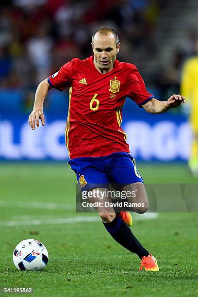 Andres Iniesta of Spain runs with the ball during the UEFA EURO 2016 Group D match between Spain and Turkey at Allianz Riviera Stadium on June 17,...