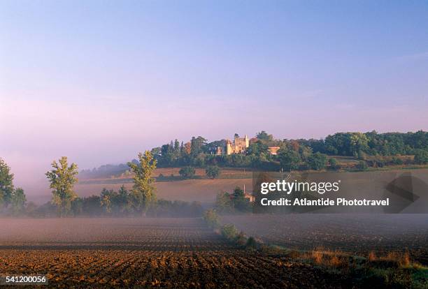 misty fields and countryside - agen stock pictures, royalty-free photos & images