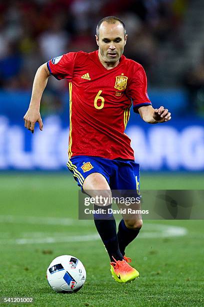 Andres Iniesta of Spain runs with the ball during the UEFA EURO 2016 Group D match between Spain and Turkey at Allianz Riviera Stadium on June 17,...